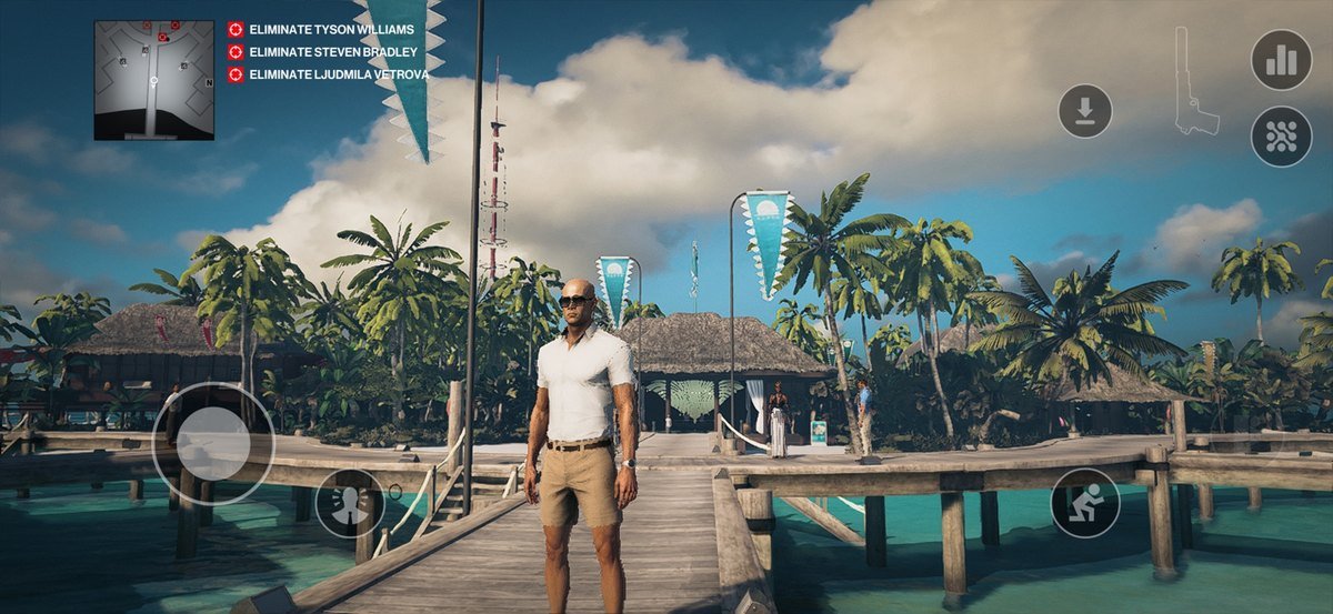 HITMAN World of Assassination on iPhone with touch controls on a dock