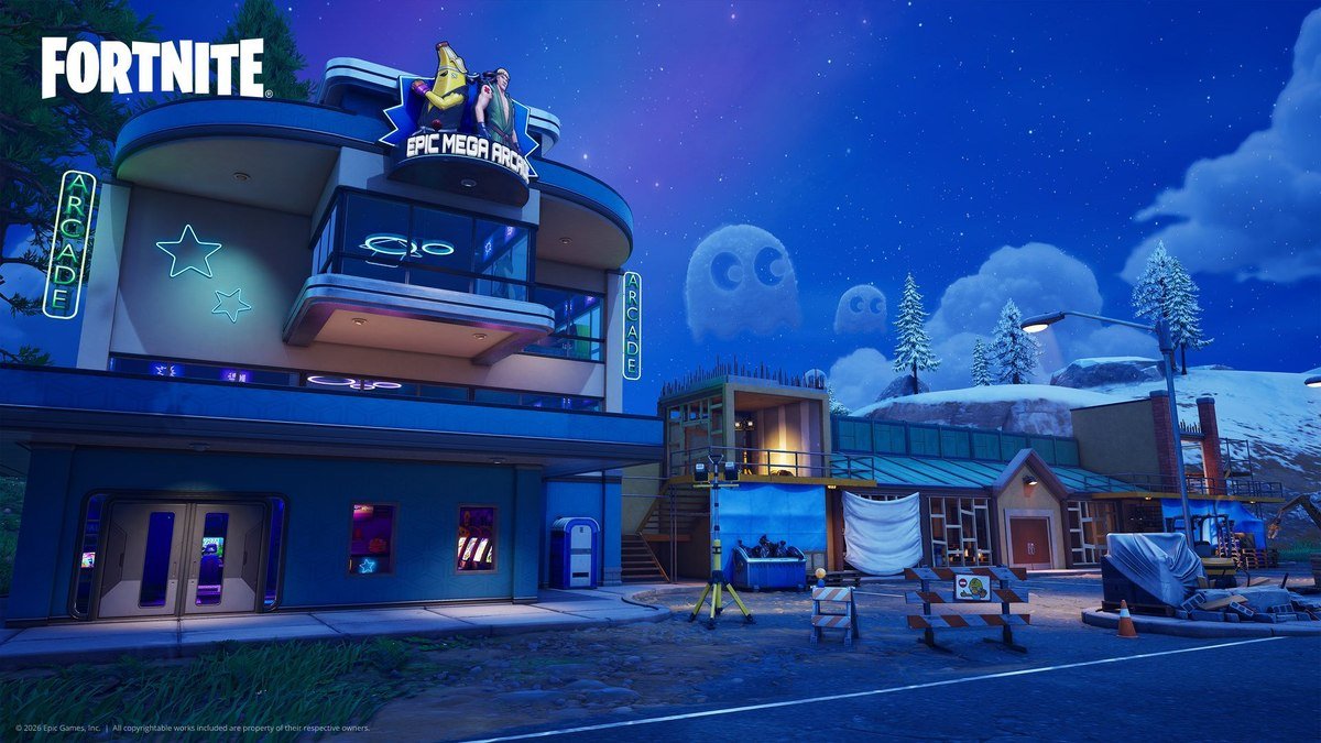 Fortnite Override screenshot of the Epic Mega Arcade building at night with Pac-Man ghost clouds in the sky