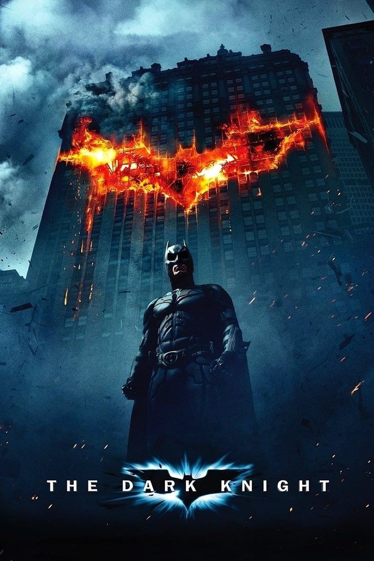 The Dark Knight poster showing a burning bat symbol on a glass skyscraper