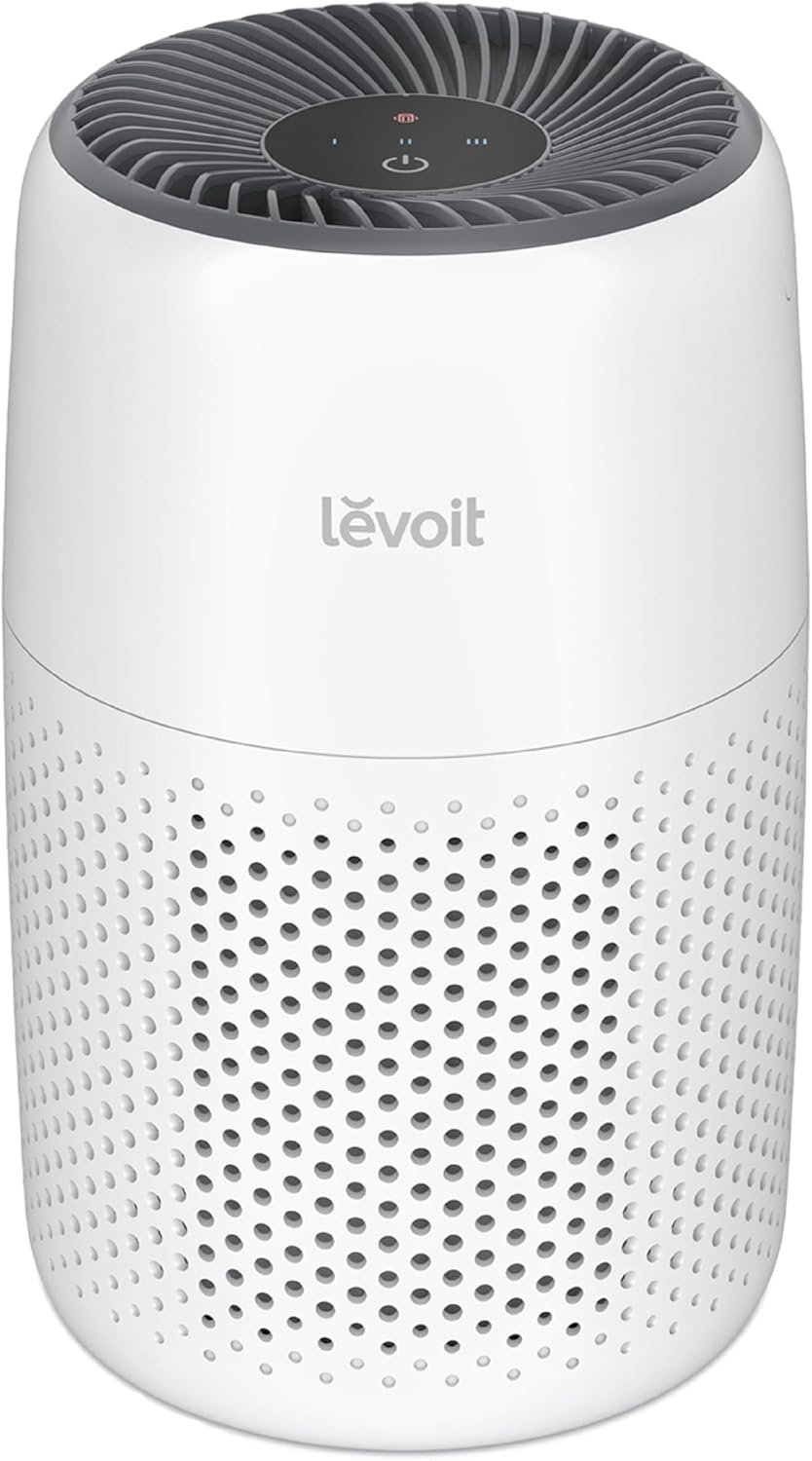 Levoit Core Mini-P compact air purifier in white on a small cylindrical body