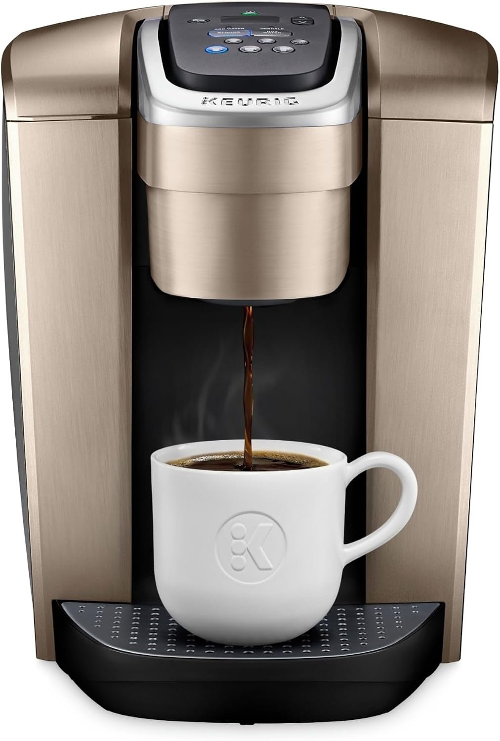 Keurig K-Elite single serve pod coffee maker in brushed gold brewing into a white mug
