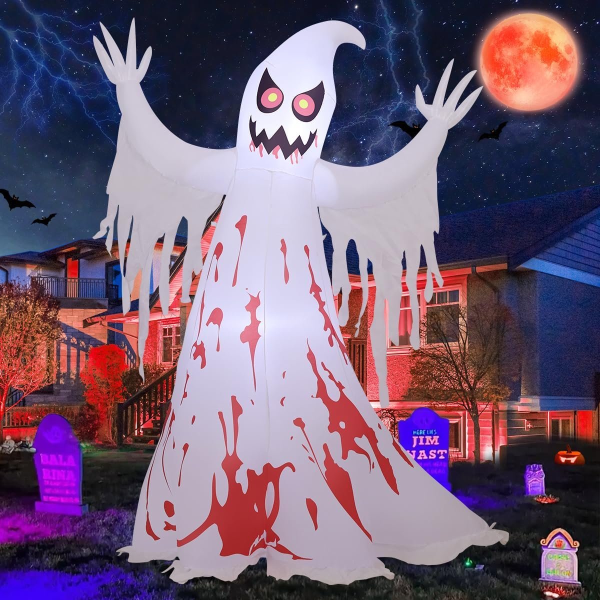 GOOSH 8.2 foot inflatable bloodstained ghost lit from inside on a front lawn at night