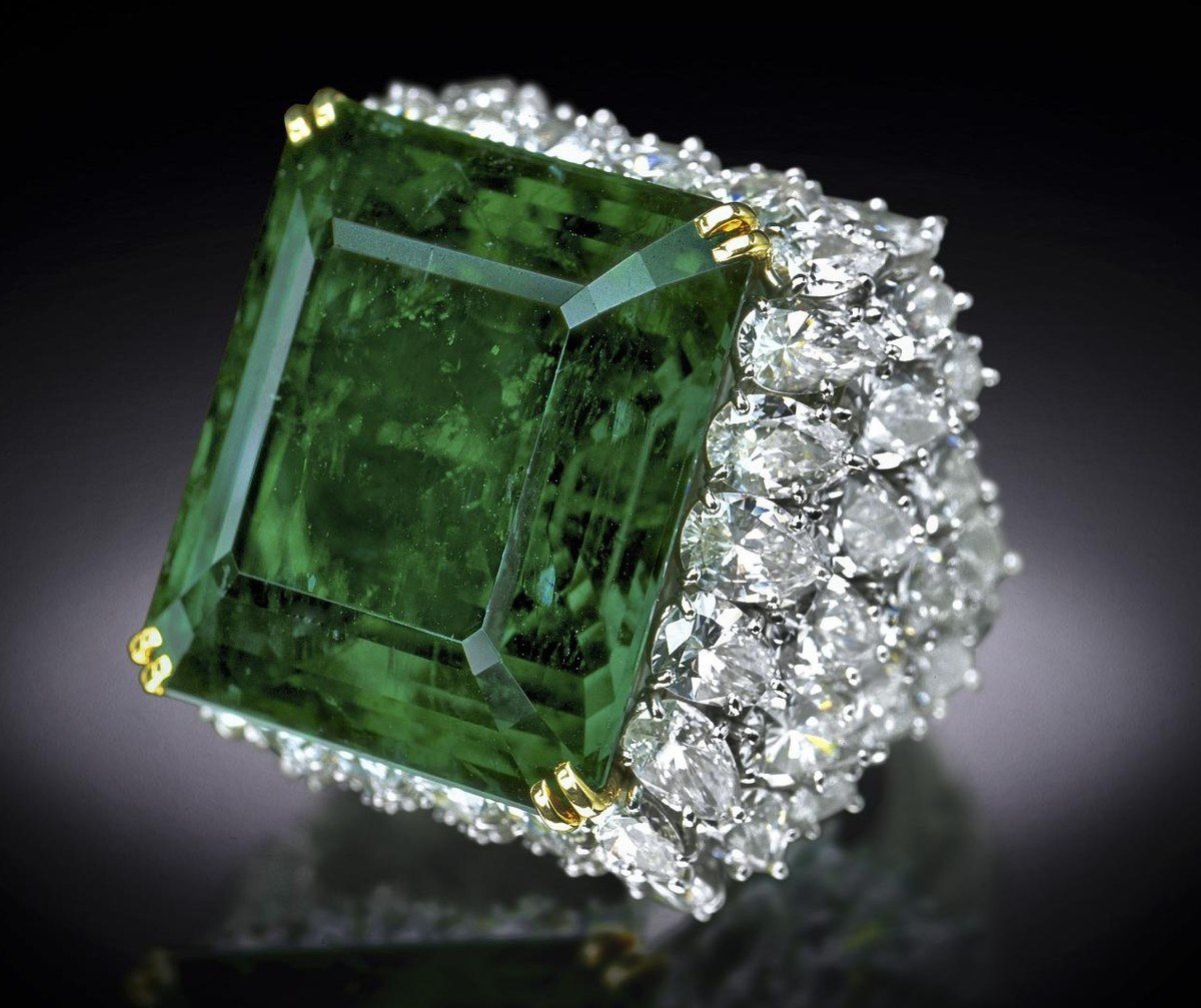 The 37.8-carat Chalk Emerald set in a ring with pear-shaped diamonds