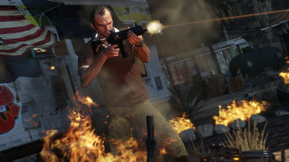 Trevor firing an assault rifle beside burning wreckage in GTA 5