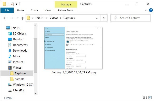 File Explorer open at This PC, Videos, Captures holding a Game Bar PNG capture