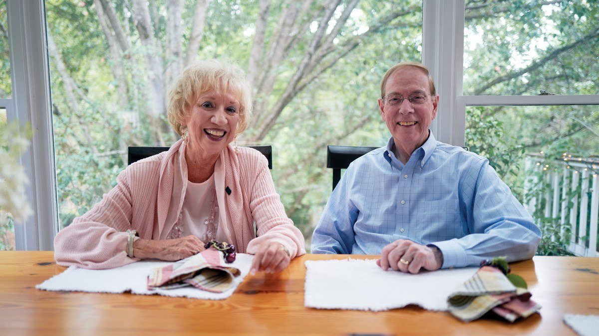 Gary Chapman and his wife Karolyn seated at their dining table