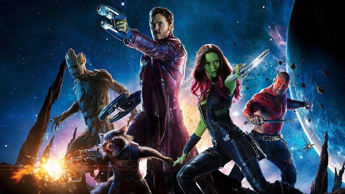 The five Guardians pose with weapons in deep space