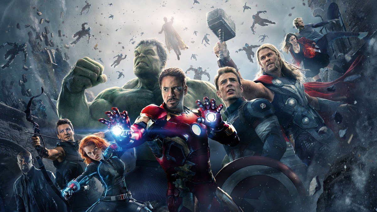 The Avengers charge forward through floating debris with Hulk and Thor in front