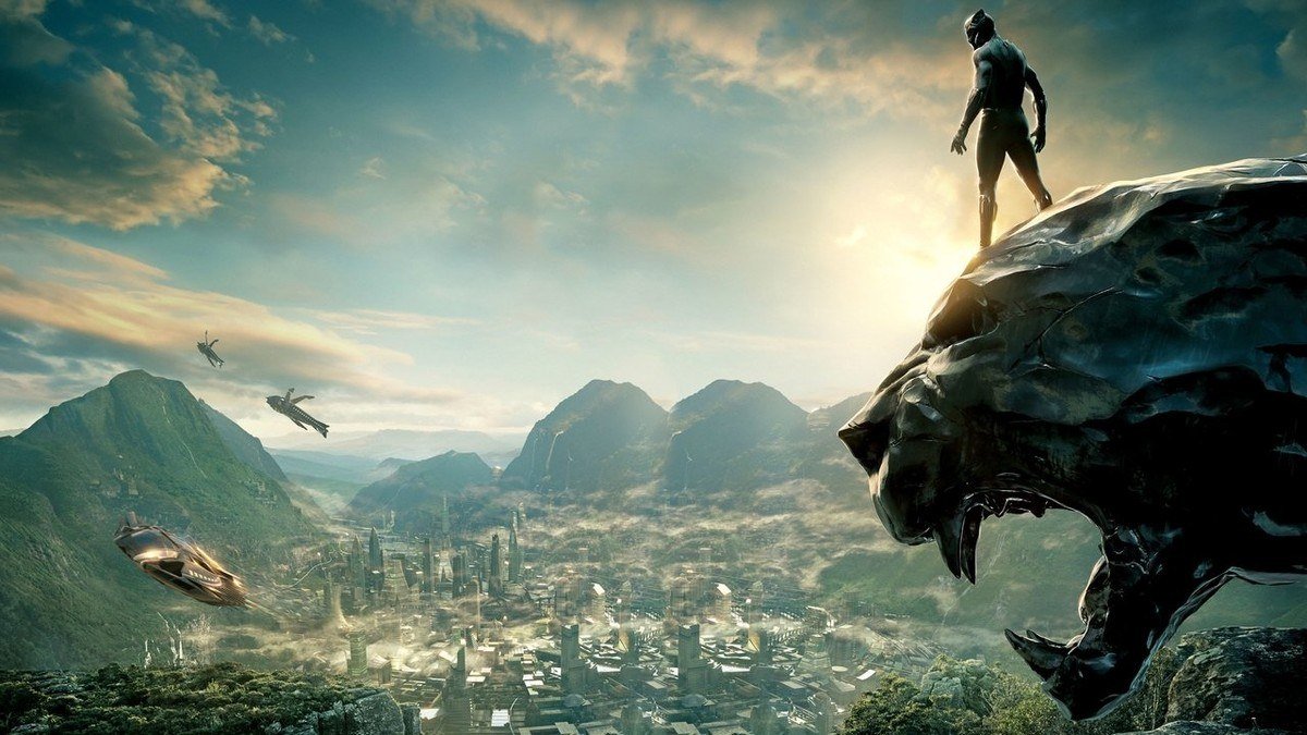 Black Panther stands on a cliff carved like a panther, overlooking Wakanda