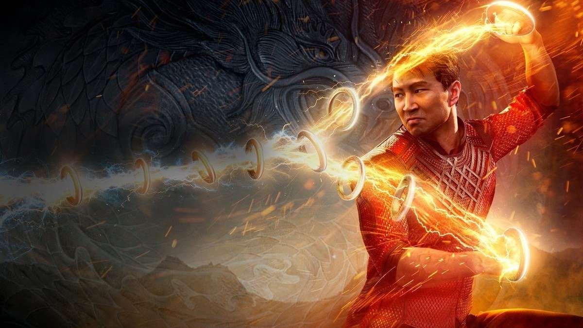 Shang-Chi summons the glowing Ten Rings around his arms