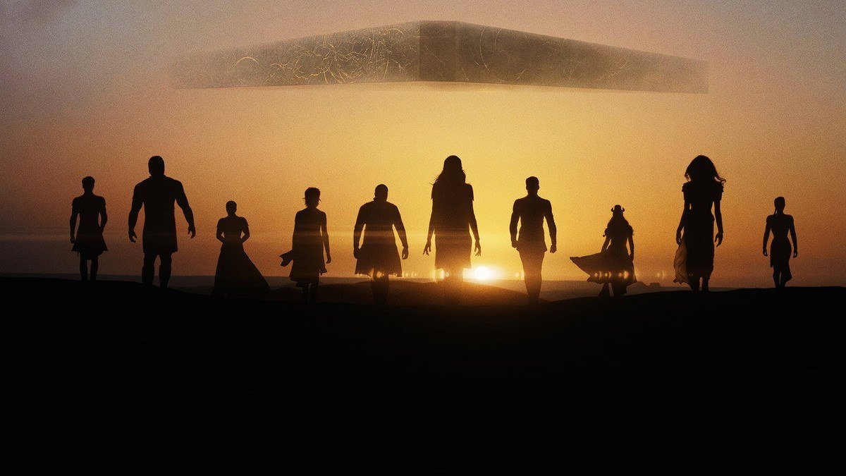 The Eternals stand in silhouette at sunset beneath a hovering ship