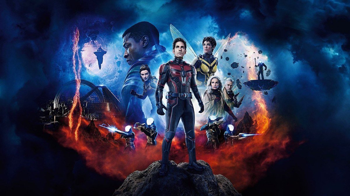 Ant-Man stands on a rock with his allies in a vivid Quantum Realm