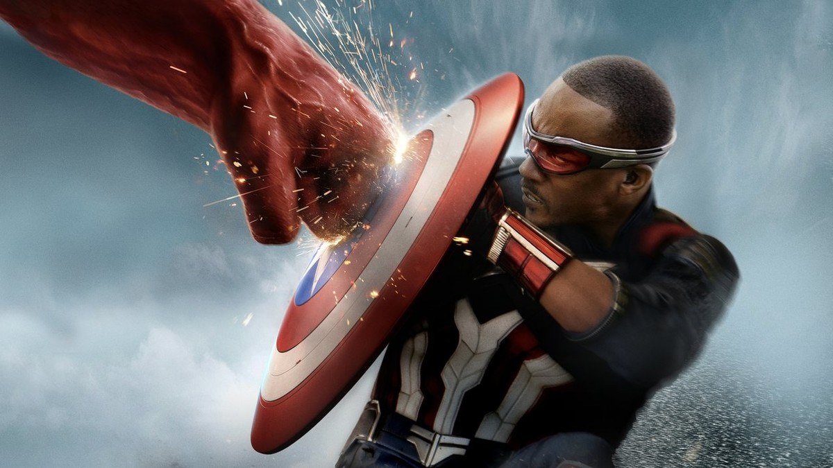 Sam Wilson blocks a giant red fist with the Captain America shield