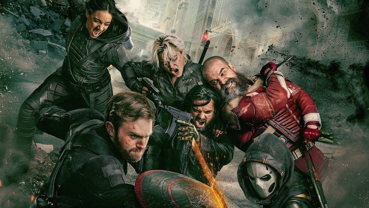 The Thunderbolts antihero team crowds together in a battle pose in a ruined street