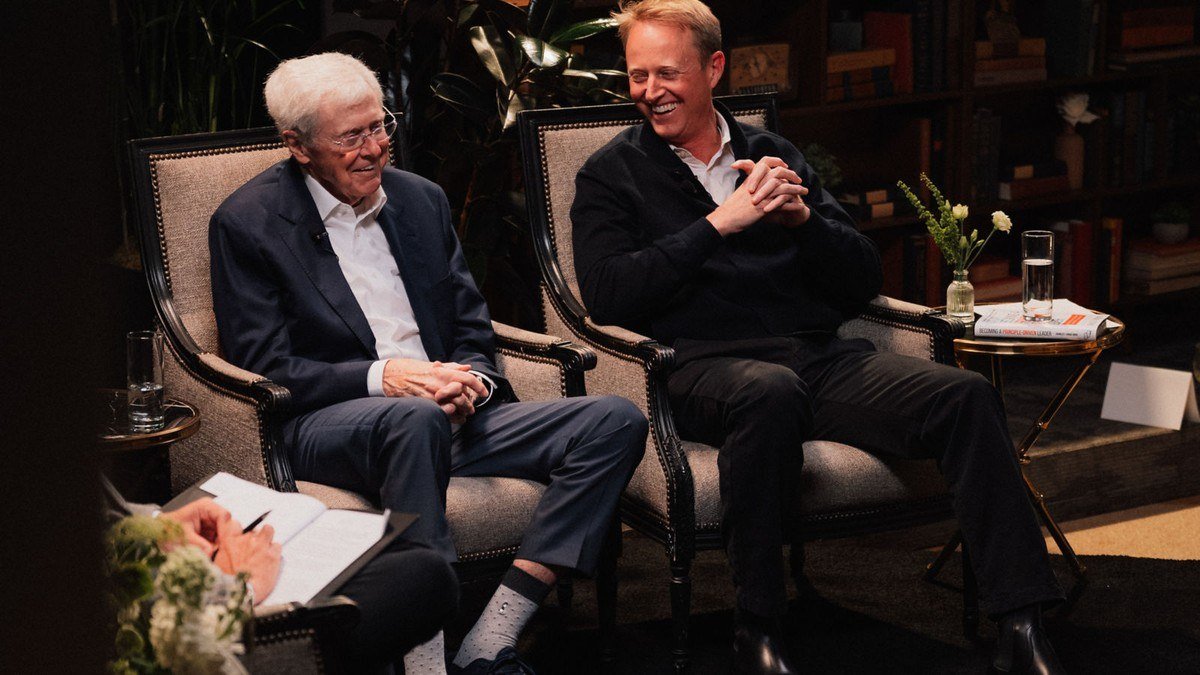 Charles Koch and Chase Koch seated together